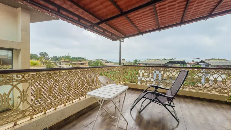 Rooftop lounge chair looking out over Lonavala